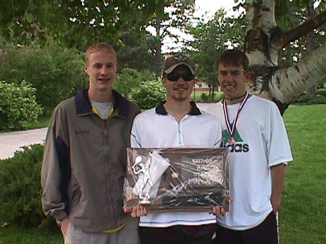 Picture of 1998 boys with their 2nd place state trophy