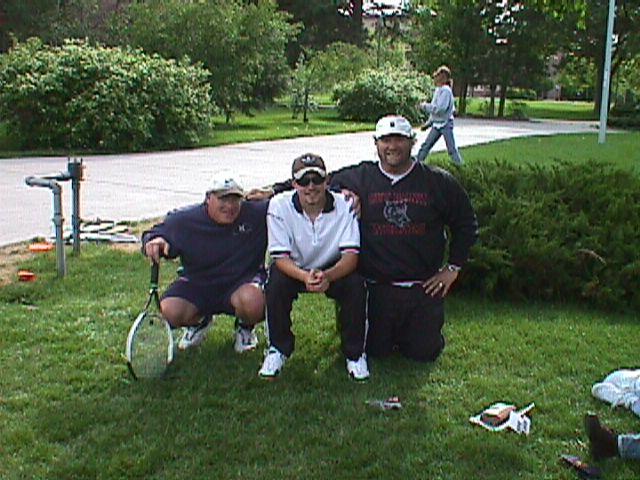 Picture of coaches with player Adam Crail